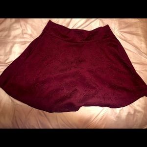 Burgundy min skirt with Foral detailing